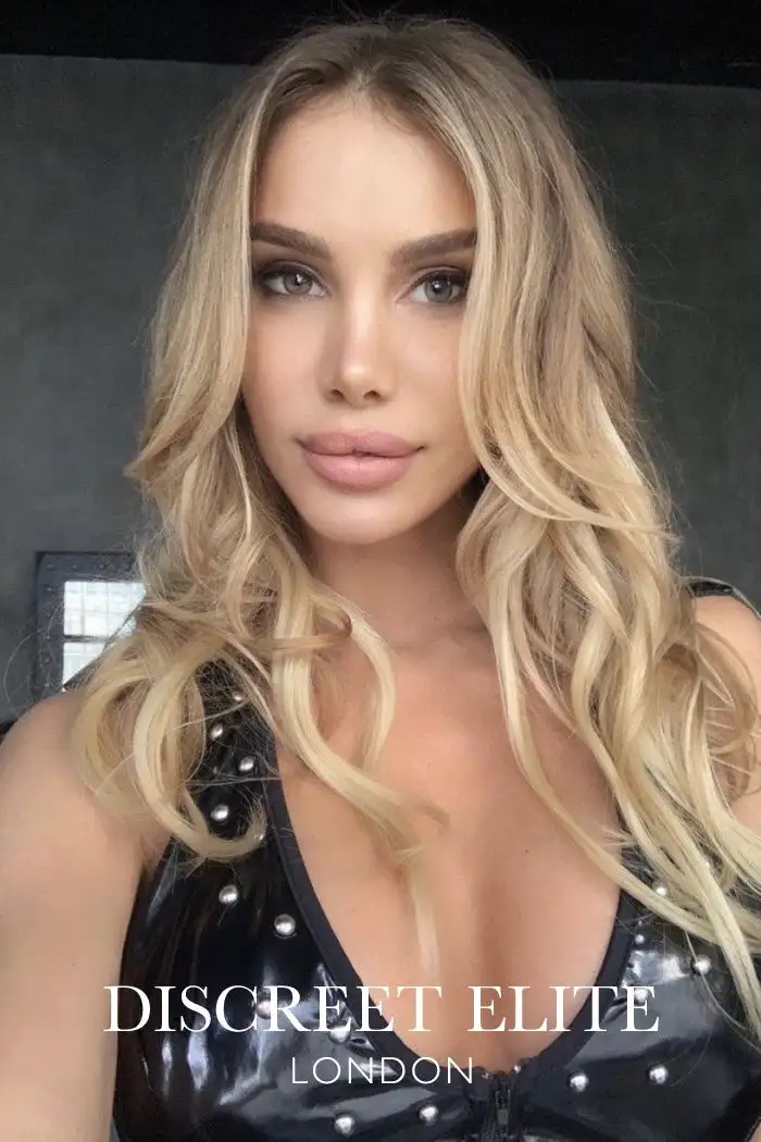 Cleavage discreetly being street busty Val - Stunning Escort - Discreet Elite